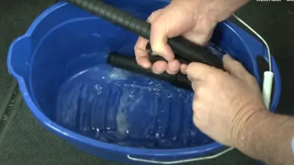 gravity-drain-the-washer-into-a-bucket