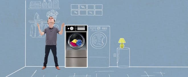 Man stands exasperated by washer that won’t start