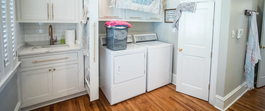 Gibson washer and dryer in a laundry room.