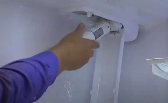 extend-the-water-filter-housing-completely-to-remove-the-filter