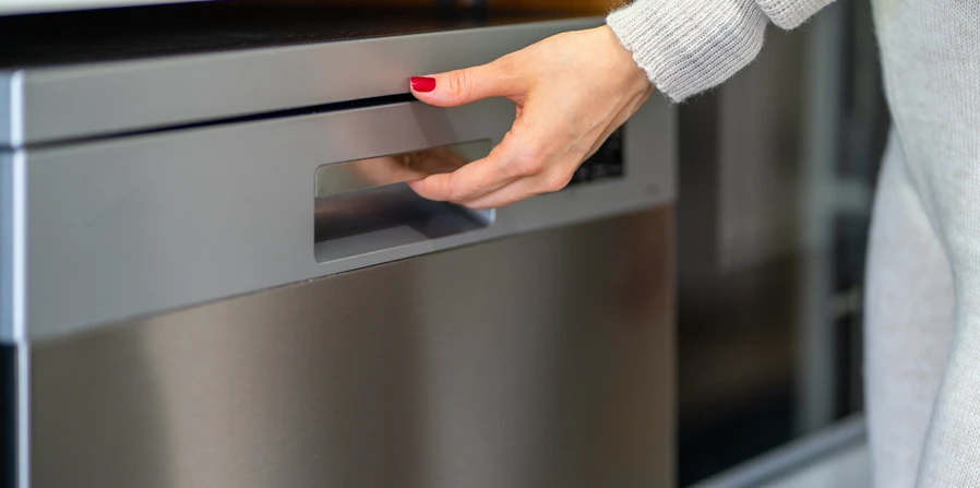 Homeowner finding a broken dishwasher door handle