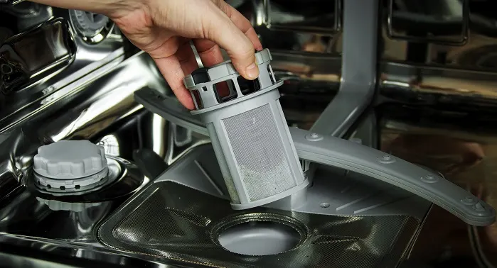 Image of removing and cleaning the dishwasher filter
